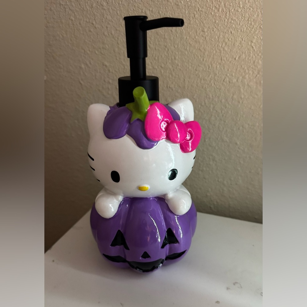 hello kitty purple pumpkin dispenser